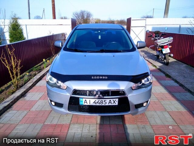 Сірий Міцубісі Lancer, об'ємом двигуна 2 л та пробігом 206 тис. км за 6500 $, фото 6 на Automoto.ua