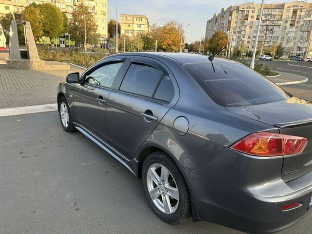 Сірий Міцубісі Lancer, об'ємом двигуна 2 л та пробігом 219 тис. км за 6700 $, фото 3 на Automoto.ua
