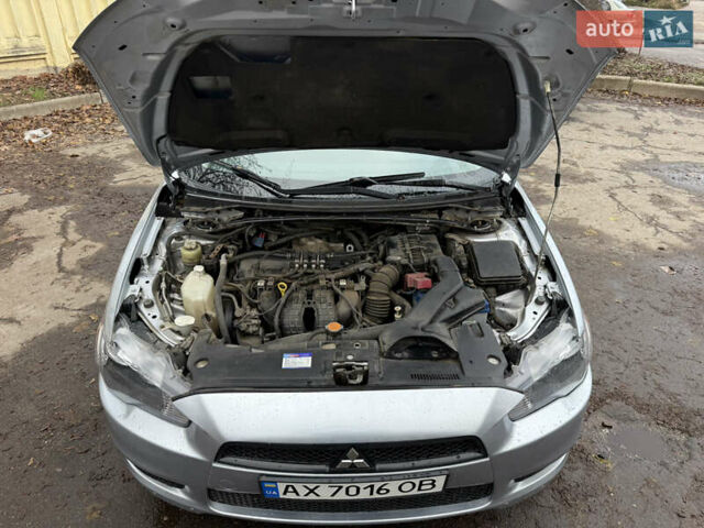 Серый Мицубиси Лансер, объемом двигателя 2 л и пробегом 265 тыс. км за 5200 $, фото 10 на Automoto.ua