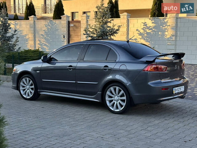 Сірий Міцубісі Lancer, об'ємом двигуна 2 л та пробігом 92 тис. км за 9800 $, фото 27 на Automoto.ua