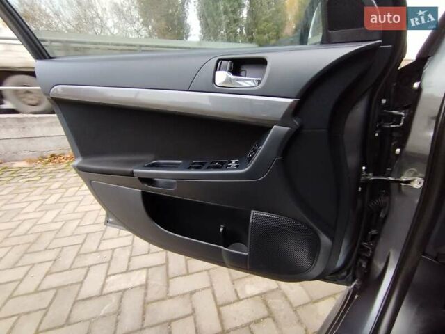 Міцубісі Lancer 2008 у Хмельницькому на Automoto.ua Сірий Міцубісі Lancer, об'ємом двигуна 2 л та пробігом 157 тис. км за 6300 $, фото 32 на Automoto.ua