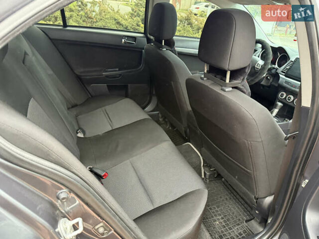 Сірий Міцубісі Lancer, об'ємом двигуна 2 л та пробігом 92 тис. км за 8200 $, фото 35 на Automoto.ua