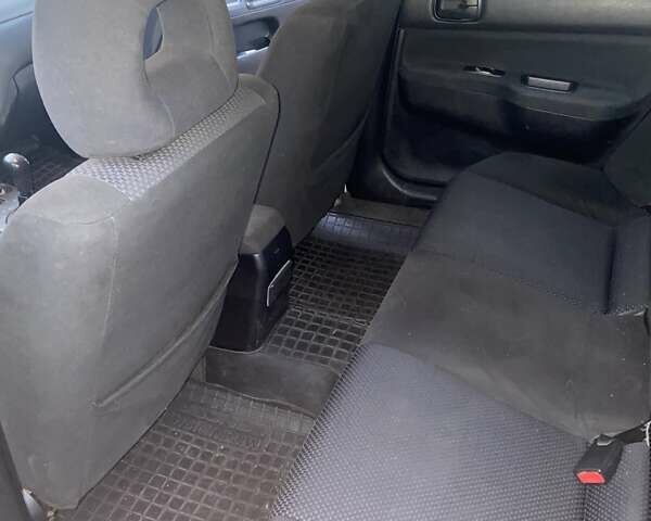 Сірий Міцубісі Lancer, об'ємом двигуна 1.6 л та пробігом 250 тис. км за 3500 $, фото 10 на Automoto.ua