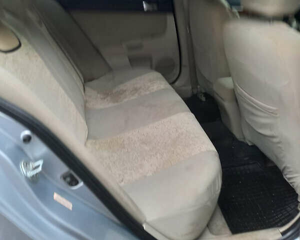 Сірий Міцубісі Lancer, об'ємом двигуна 2 л та пробігом 180 тис. км за 6400 $, фото 5 на Automoto.ua