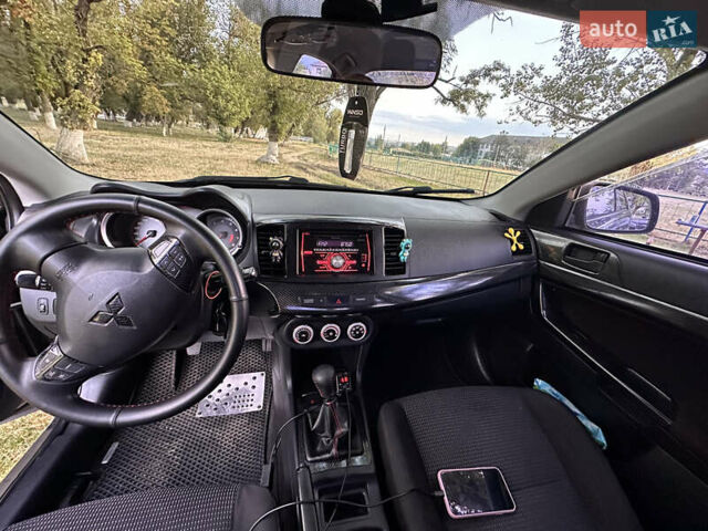 Серый Мицубиси Лансер, объемом двигателя 1.5 л и пробегом 255 тыс. км за 6000 $, фото 10 на Automoto.ua