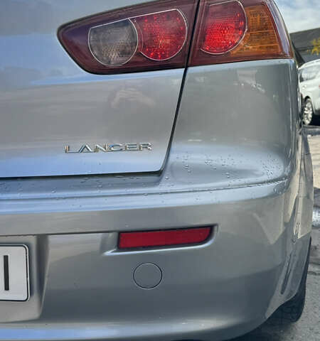 Серый Мицубиси Лансер, объемом двигателя 2 л и пробегом 190 тыс. км за 6900 $, фото 21 на Automoto.ua