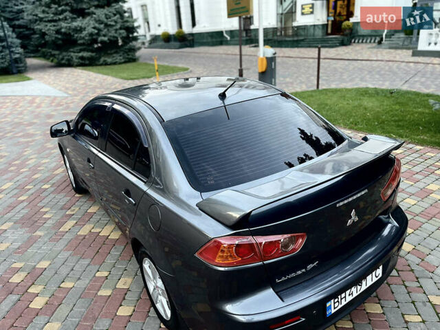 Серый Мицубиси Лансер, объемом двигателя 2 л и пробегом 212 тыс. км за 6000 $, фото 8 на Automoto.ua