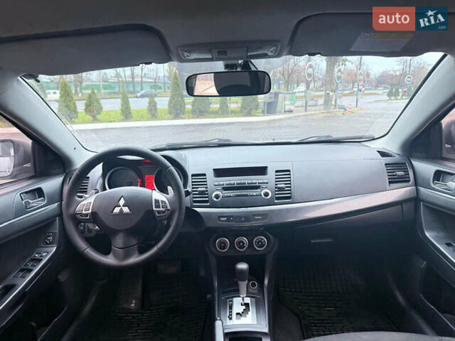 Серый Мицубиси Лансер, объемом двигателя 2 л и пробегом 220 тыс. км за 6500 $, фото 8 на Automoto.ua