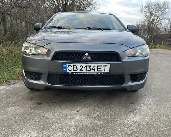 Серый Мицубиси Лансер, объемом двигателя 1.5 л и пробегом 255 тыс. км за 6500 $, фото 6 на Automoto.ua