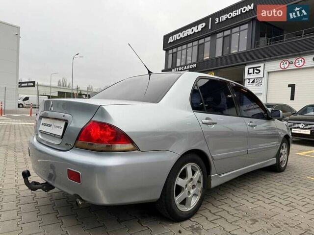 Сірий Міцубісі Lancer, об'ємом двигуна 1.6 л та пробігом 206 тис. км за 4799 $, фото 7 на Automoto.ua