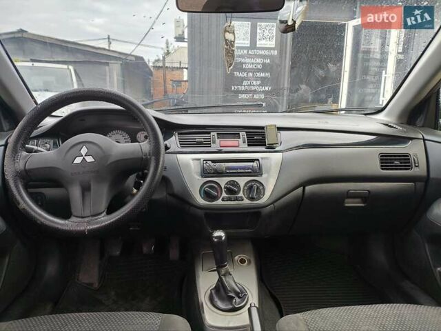 Сірий Міцубісі Lancer, об'ємом двигуна 1.6 л та пробігом 240 тис. км за 2999 $, фото 2 на Automoto.ua