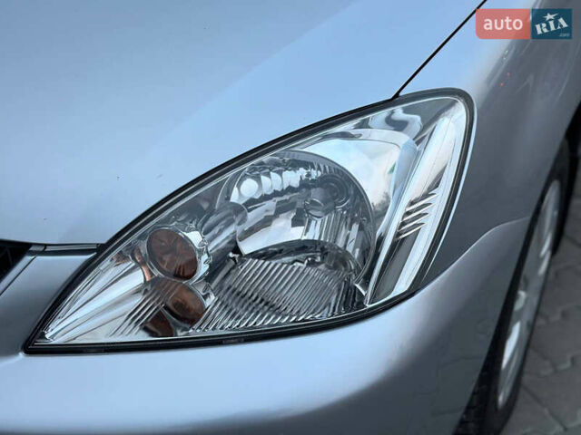 Серый Мицубиси Лансер, объемом двигателя 1.58 л и пробегом 34 тыс. км за 7500 $, фото 50 на Automoto.ua