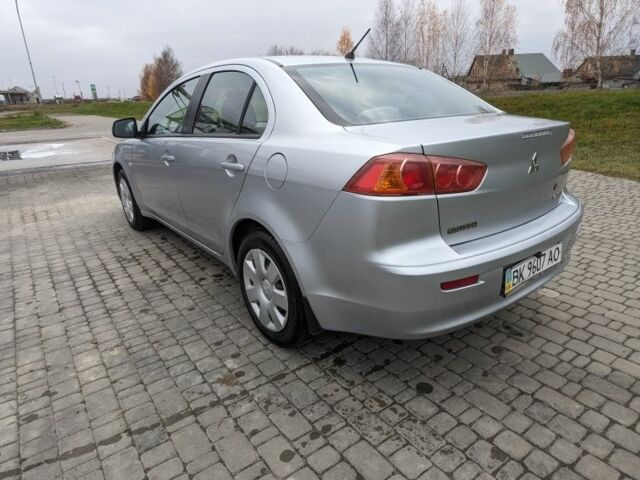 Серый Мицубиси Лансер, объемом двигателя 1.5 л и пробегом 147 тыс. км за 6700 $, фото 8 на Automoto.ua