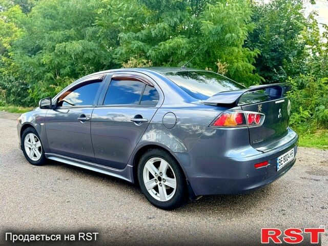 Серый Мицубиси Лансер, объемом двигателя 2 л и пробегом 250 тыс. км за 5800 $, фото 3 на Automoto.ua