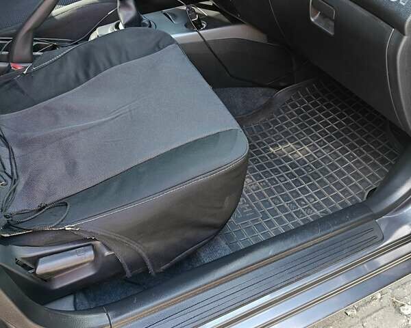 Сірий Міцубісі Lancer, об'ємом двигуна 1.58 л та пробігом 97 тис. км за 6800 $, фото 13 на Automoto.ua