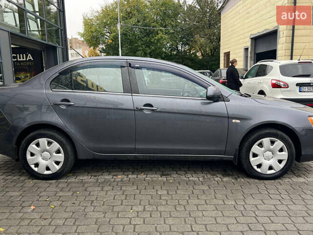 Серый Мицубиси Лансер, объемом двигателя 1.5 л и пробегом 239 тыс. км за 6000 $, фото 4 на Automoto.ua