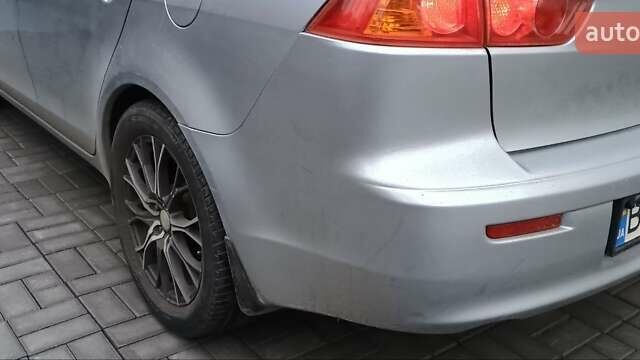 Серый Мицубиси Лансер, объемом двигателя 1.5 л и пробегом 230 тыс. км за 6300 $, фото 5 на Automoto.ua