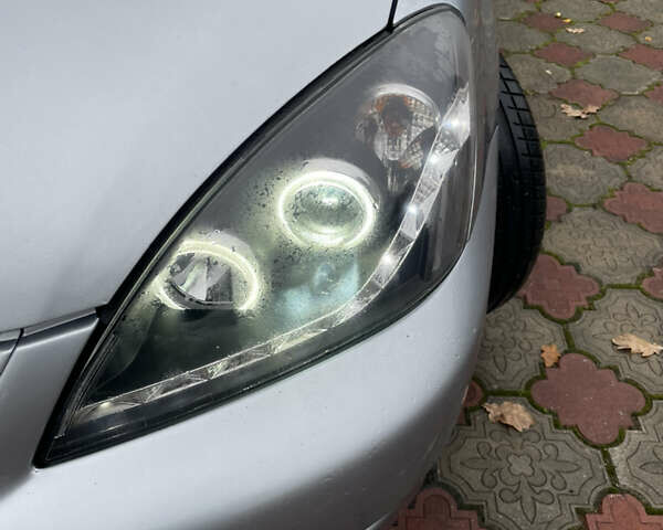 Сірий Міцубісі Lancer, об'ємом двигуна 1.59 л та пробігом 219 тис. км за 4500 $, фото 11 на Automoto.ua