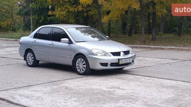 Сірий Міцубісі Lancer, об'ємом двигуна 1.6 л та пробігом 176 тис. км за 4999 $, фото 17 на Automoto.ua