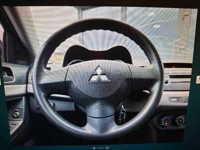 Серый Мицубиси Лансер, объемом двигателя 1.5 л и пробегом 235 тыс. км за 6500 $, фото 8 на Automoto.ua