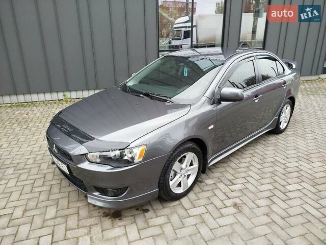 Міцубісі Lancer 2008 у Хмельницькому на Automoto.ua Сірий Міцубісі Lancer, об'ємом двигуна 2 л та пробігом 157 тис. км за 6300 $, фото 6 на Automoto.ua