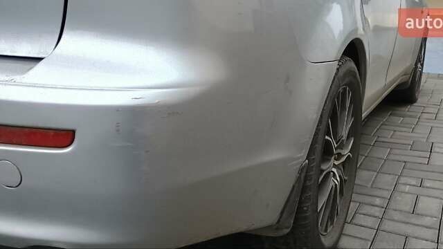 Серый Мицубиси Лансер, объемом двигателя 1.5 л и пробегом 230 тыс. км за 6300 $, фото 4 на Automoto.ua