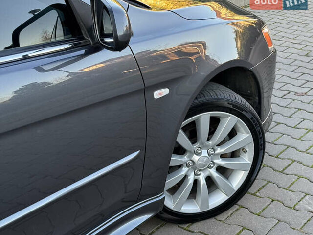 Сірий Міцубісі Lancer, об'ємом двигуна 2 л та пробігом 92 тис. км за 9800 $, фото 53 на Automoto.ua