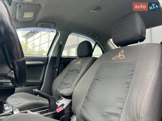 Серый Мицубиси Лансер, объемом двигателя 1.5 л и пробегом 239 тыс. км за 6000 $, фото 15 на Automoto.ua