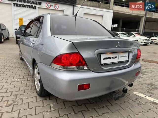 Сірий Міцубісі Lancer, об'ємом двигуна 1.6 л та пробігом 206 тис. км за 4799 $, фото 4 на Automoto.ua