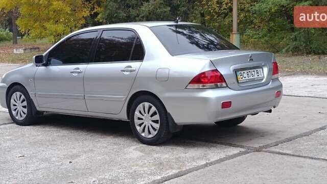 Сірий Міцубісі Lancer, об'ємом двигуна 1.6 л та пробігом 176 тис. км за 4999 $, фото 7 на Automoto.ua