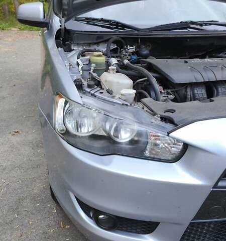 Міцубісі Lancer 2008 у Києві на Automoto.ua Сірий Міцубісі Lancer, об'ємом двигуна 2 л та пробігом 175 тис. км за 8200 $, фото 17 на Automoto.ua