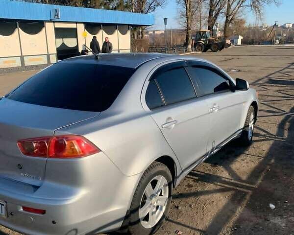 Серый Мицубиси Лансер, объемом двигателя 1.5 л и пробегом 160 тыс. км за 5300 $, фото 16 на Automoto.ua