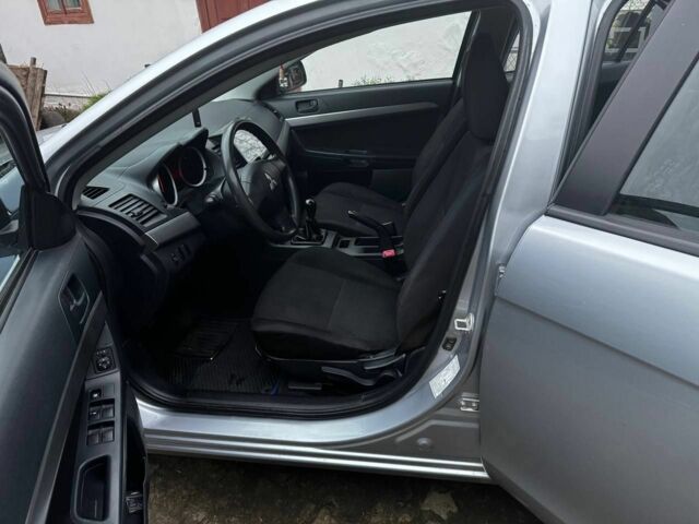 Серый Мицубиси Лансер, объемом двигателя 1.5 л и пробегом 147 тыс. км за 6700 $, фото 13 на Automoto.ua