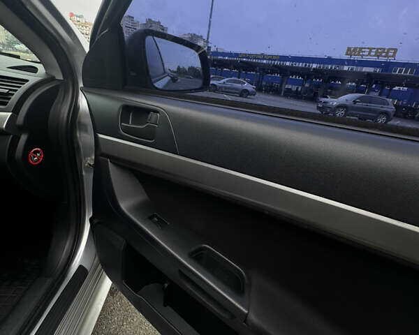 Сірий Міцубісі Lancer, об'ємом двигуна 2 л та пробігом 185 тис. км за 7000 $, фото 20 на Automoto.ua