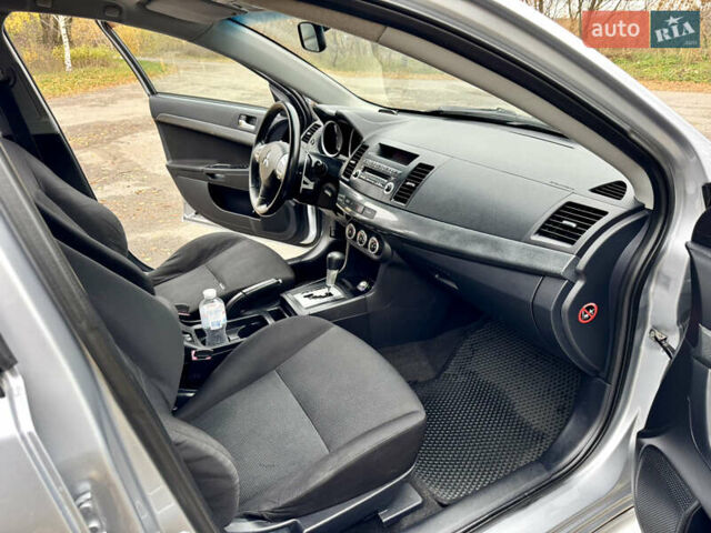 Сірий Міцубісі Lancer, об'ємом двигуна 2 л та пробігом 225 тис. км за 6890 $, фото 15 на Automoto.ua