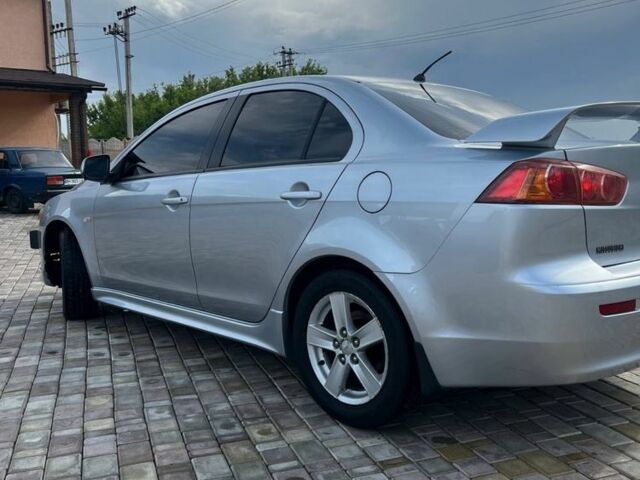 Сірий Міцубісі Lancer, об'ємом двигуна 2 л та пробігом 238 тис. км за 6400 $, фото 1 на Automoto.ua