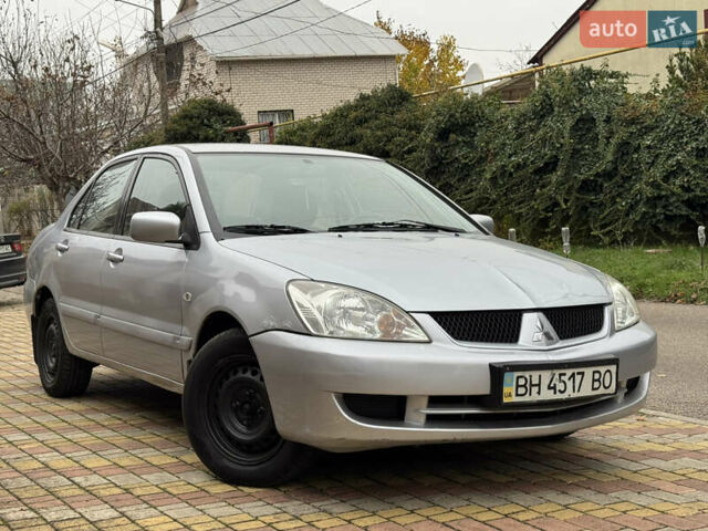 Сірий Міцубісі Lancer, об'ємом двигуна 1.6 л та пробігом 221 тис. км за 3650 $, фото 9 на Automoto.ua