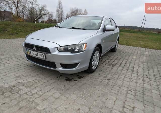 Серый Мицубиси Лансер, объемом двигателя 1.5 л и пробегом 147 тыс. км за 6700 $, фото 9 на Automoto.ua