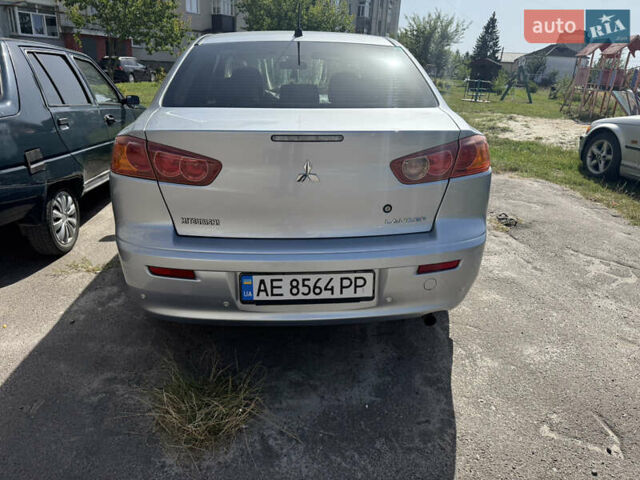 Серый Мицубиси Лансер, объемом двигателя 2 л и пробегом 175 тыс. км за 7700 $, фото 3 на Automoto.ua