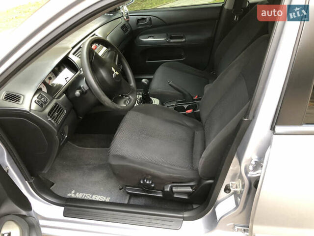 Мицубиси Лансер 2008 в Николаеве на Automoto.ua Серый Мицубиси Лансер, объемом двигателя 1.58 л и пробегом 132 тыс. км за 5900 $, фото 19 на Automoto.ua