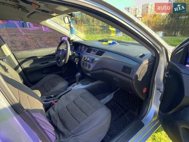 Сірий Міцубісі Lancer, об'ємом двигуна 1.6 л та пробігом 364 тис. км за 4300 $, фото 11 на Automoto.ua
