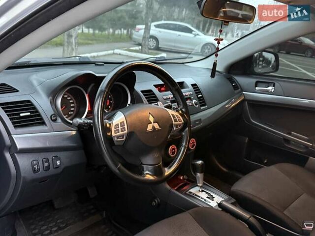 Сірий Міцубісі Lancer, об'ємом двигуна 2 л та пробігом 280 тис. км за 6999 $, фото 11 на Automoto.ua
