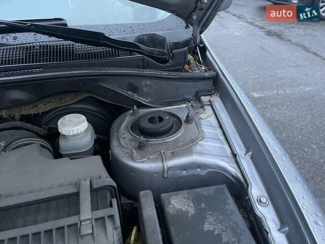 Сірий Міцубісі Lancer, об'ємом двигуна 1.58 л та пробігом 220 тис. км за 5900 $, фото 13 на Automoto.ua