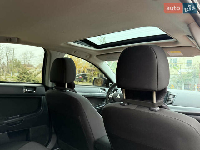 Сірий Міцубісі Lancer, об'ємом двигуна 2 л та пробігом 92 тис. км за 8200 $, фото 37 на Automoto.ua