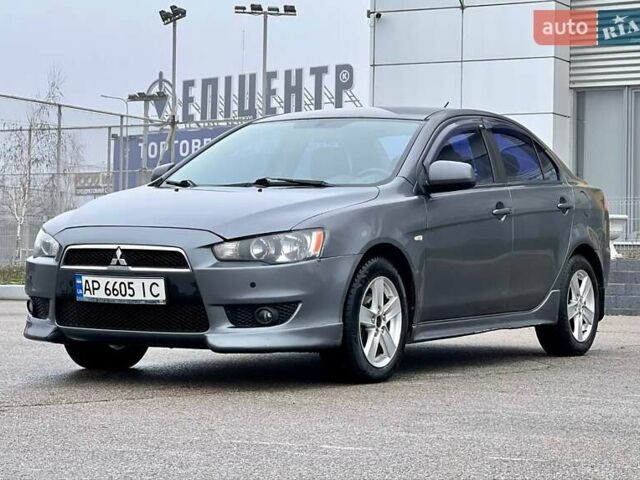 Серый Мицубиси Лансер, объемом двигателя 2 л и пробегом 203 тыс. км за 4999 $, фото 1 на Automoto.ua