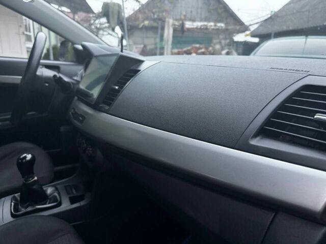 Серый Мицубиси Лансер, объемом двигателя 1.5 л и пробегом 147 тыс. км за 6700 $, фото 15 на Automoto.ua