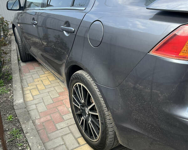 Сірий Міцубісі Lancer, об'ємом двигуна 1.8 л та пробігом 207 тис. км за 5800 $, фото 3 на Automoto.ua