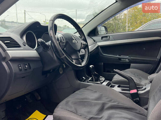 Серый Мицубиси Лансер, объемом двигателя 1.5 л и пробегом 239 тыс. км за 6000 $, фото 17 на Automoto.ua