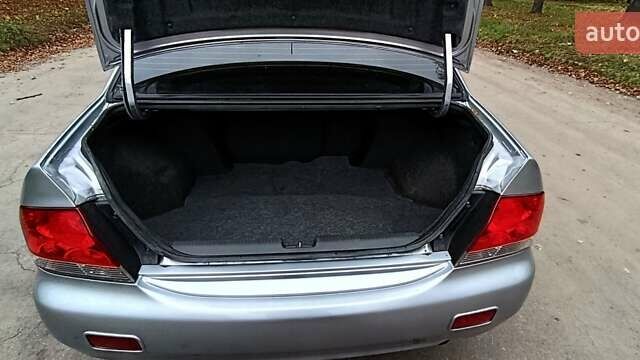 Серый Мицубиси Лансер, объемом двигателя 1.58 л и пробегом 176 тыс. км за 5000 $, фото 15 на Automoto.ua