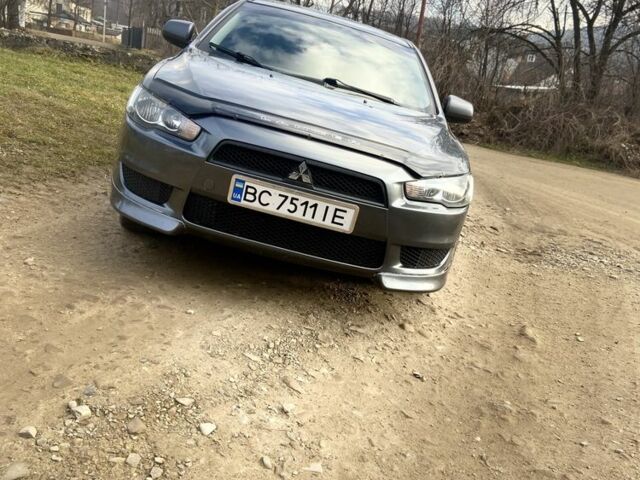 Сірий Міцубісі Lancer, об'ємом двигуна 2 л та пробігом 220 тис. км за 5750 $, фото 1 на Automoto.ua
